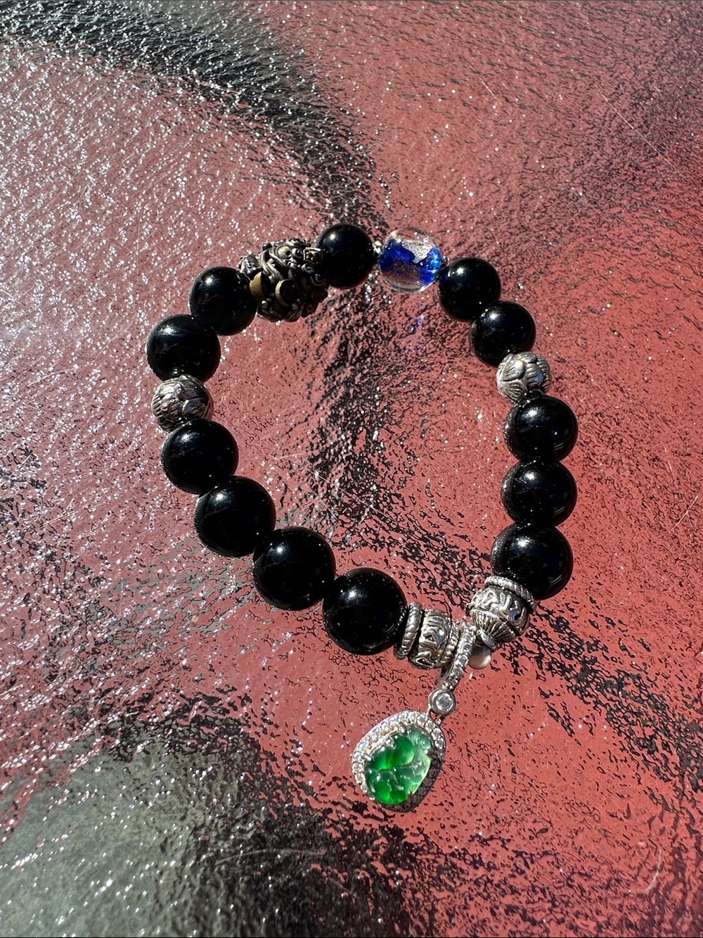 Black Beaded Bracelet with Green Gem Charm